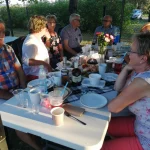 Dzień Działkowca 2019 - działkowcy przy stoliku podczas posiłku