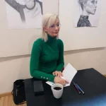 Zebranie działkowców 25.03.2023 - kobieta w zielonym golfie